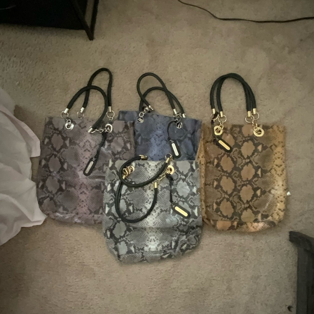 Cynthia Rowley genuine leather large totes.